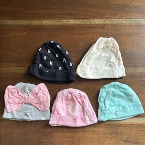 Bundle of infant hats